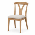 Silla de madera con cojín tapizado beige